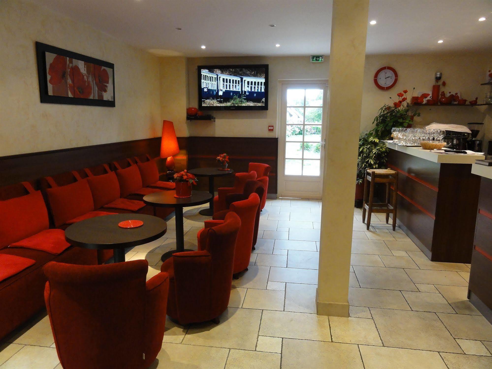 Hotel Restaurant Les Coquelicots, The Originals Relais Saint-Pardoux-l'Ortigier Restaurant billede